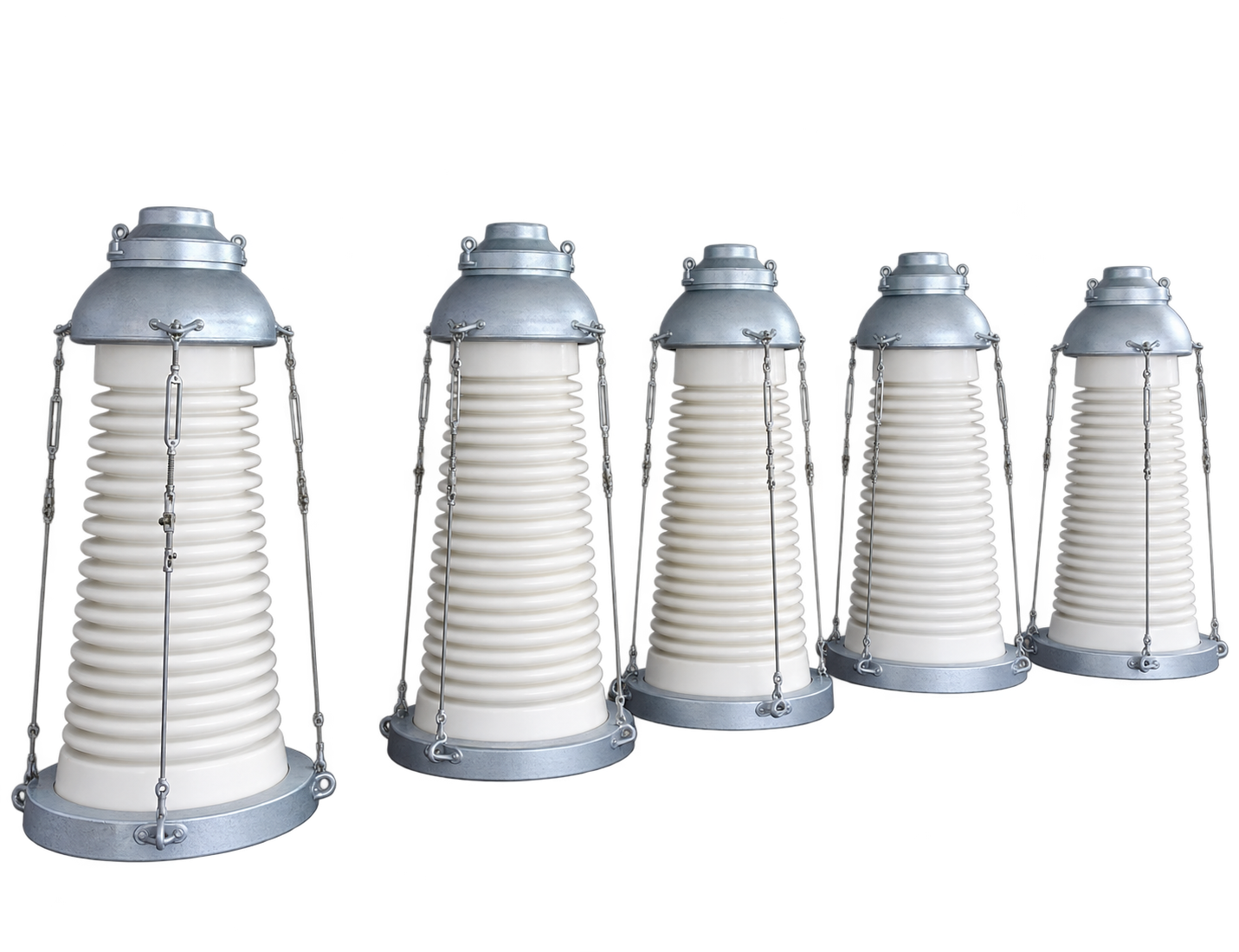 Five large ceramic insulators with metal caps and base flanges